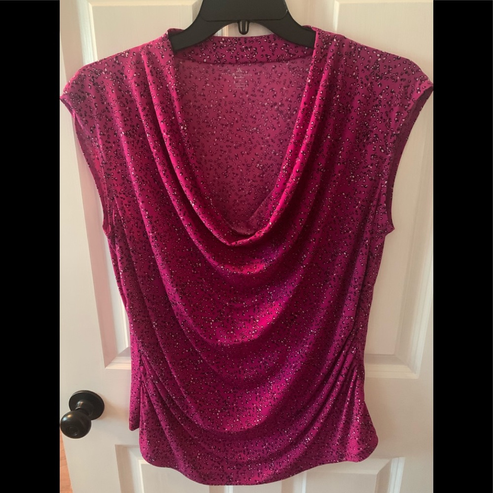 Hot pink dressy blouse. Low neck.